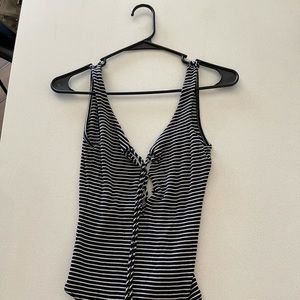 Striped bodysuit with open back and tie details.